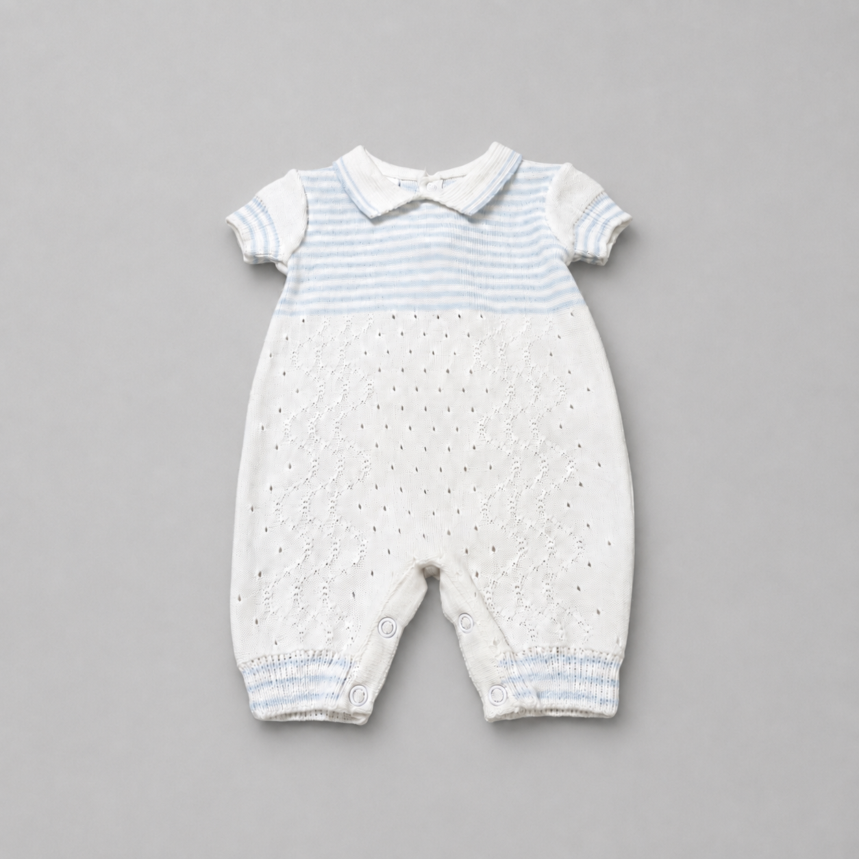 Mameluco de punto a rayas azul marino para niño