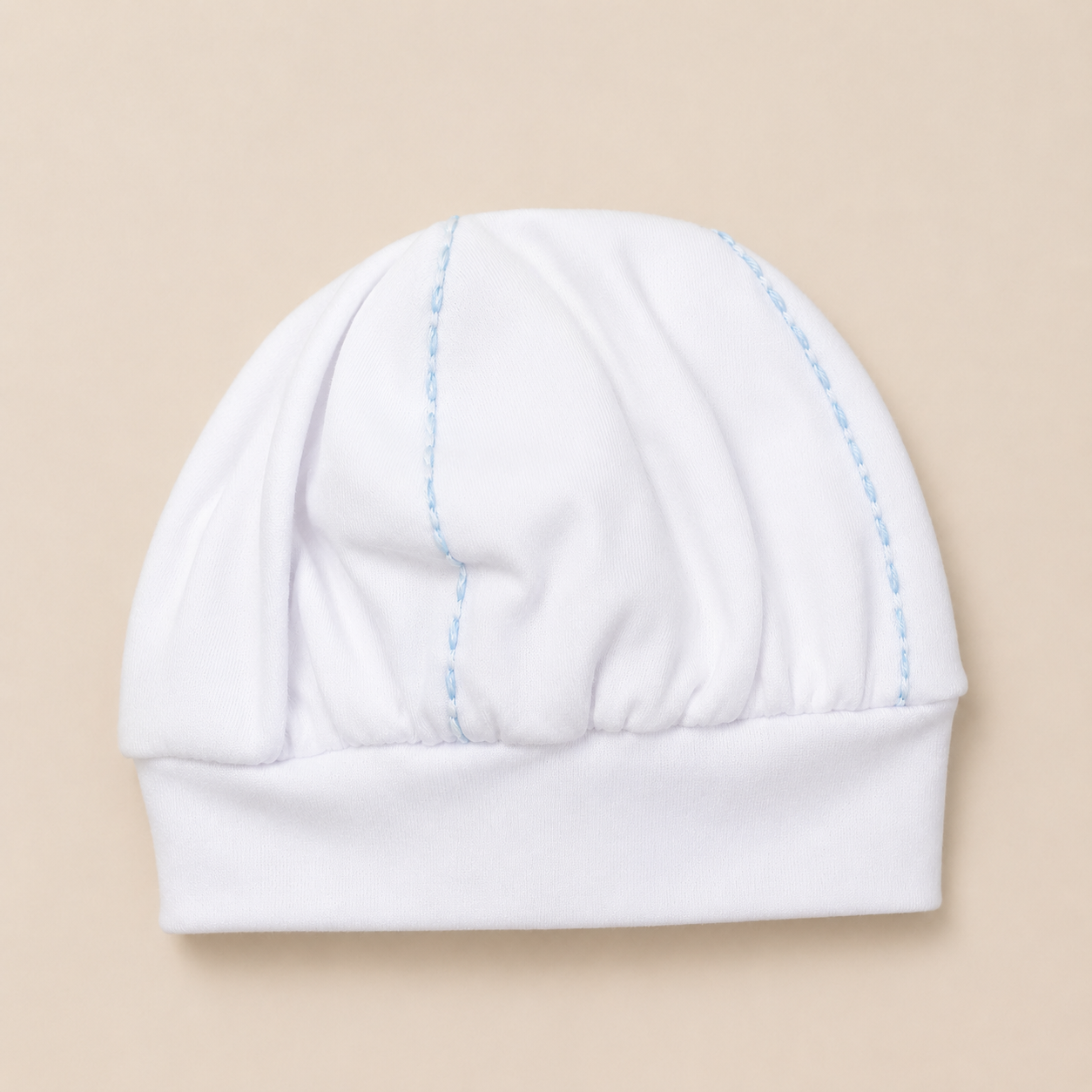 Gorro de lana con costuras azules