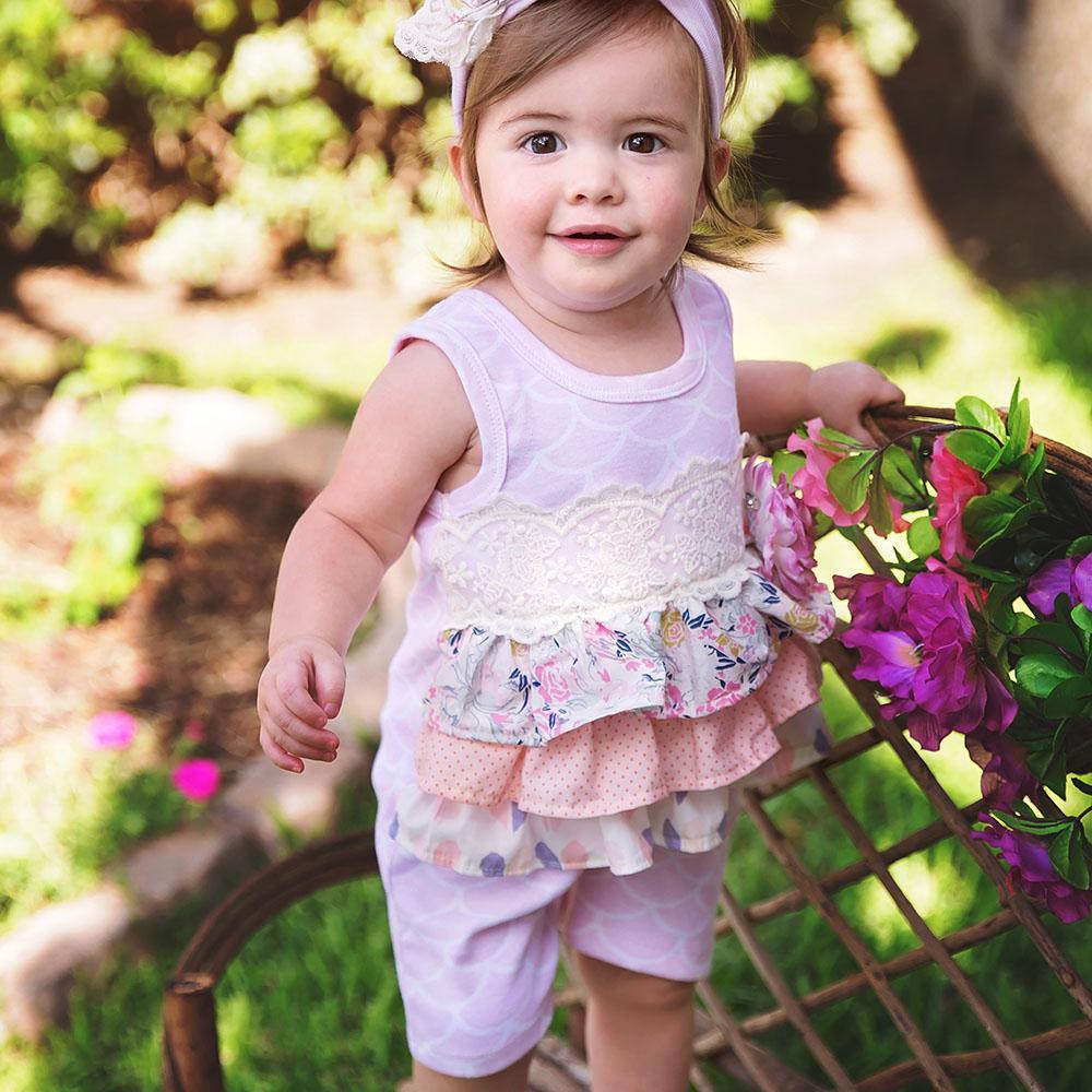 haute Baby sitting pretty romper